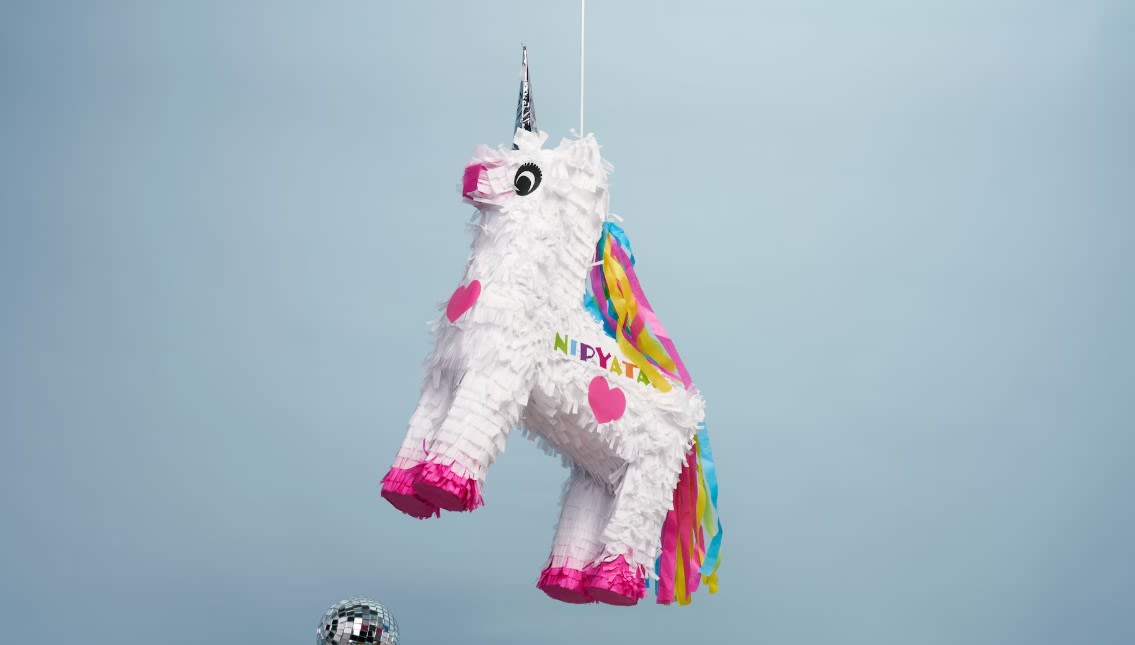 white and pink plastic toy